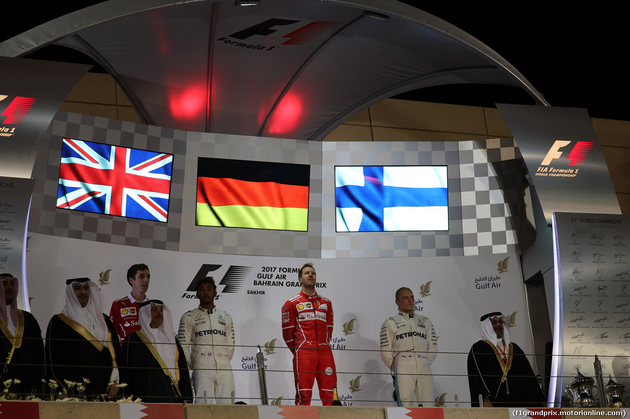 GP BAHRAIN, 16.04.2017 - Gara, 1st place Sebastian Vettel (GER) Ferrari SF70H, 2nd place Lewis Hamilton (GBR) Mercedes AMG F1 W08 e 3rd place Valtteri Bottas (FIN) Mercedes AMG F1 W08