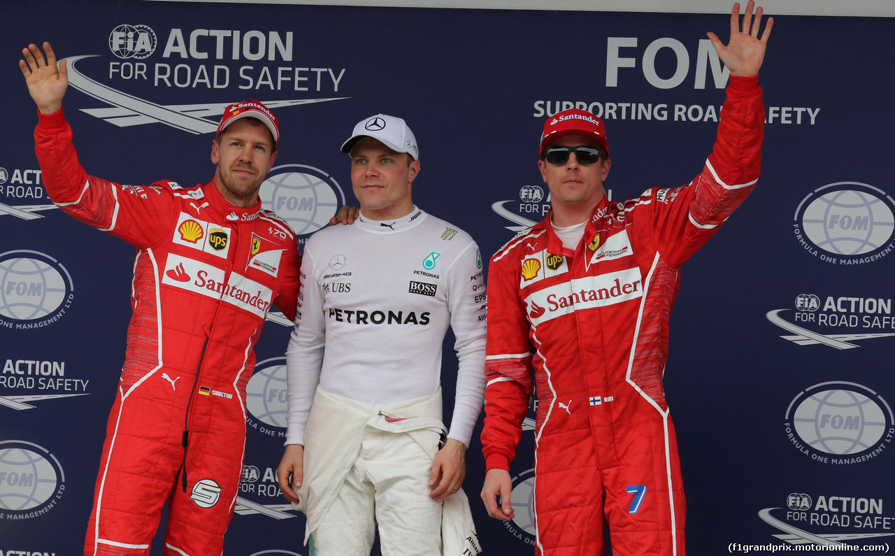 GP BRASILE, 11.11.2017 - Qualifiche, 2nd place Sebastian Vettel (GER) Ferrari SF70H, Valtteri Bottas (FIN) Mercedes AMG F1 W08 pole position e 3rd place Kimi Raikkonen (FIN) Ferrari SF70H