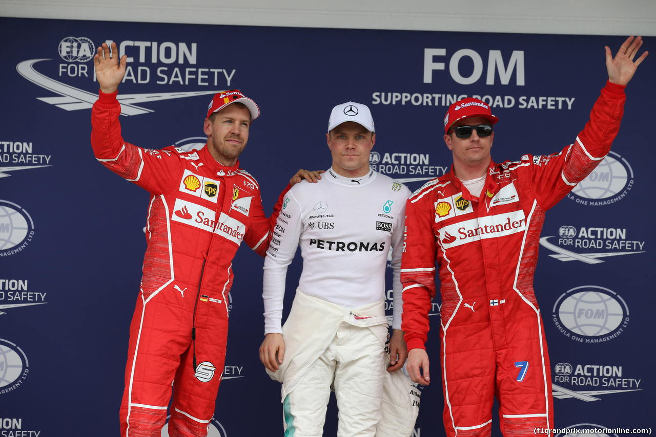 GP BRASILE, 11.11.2017 - Qualifiche, 2nd place Sebastian Vettel (GER) Ferrari SF70H, Valtteri Bottas (FIN) Mercedes AMG F1 W08 pole position e 3rd place Kimi Raikkonen (FIN) Ferrari SF70H