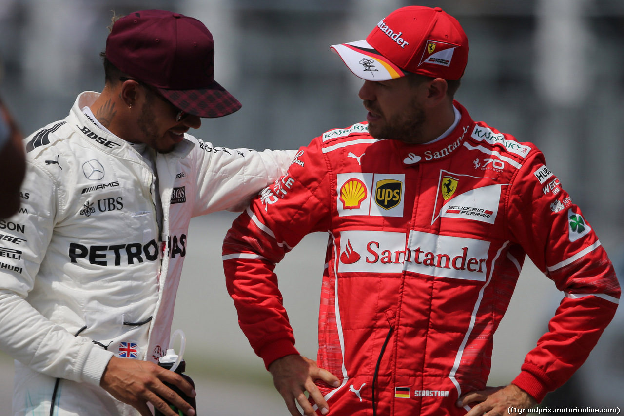 GP CANADA, 10.06.2017- Qualifiche, Lewis Hamilton (GBR) Mercedes AMG F1 W08  talking withg Sebastian Vettel (GER) Ferrari SF70H