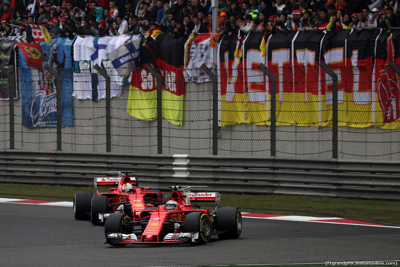 GP CINA, 09.04.2017 - Gara, Kimi Raikkonen (FIN) Ferrari SF70H e Sebastian Vettel (GER) Ferrari SF70H