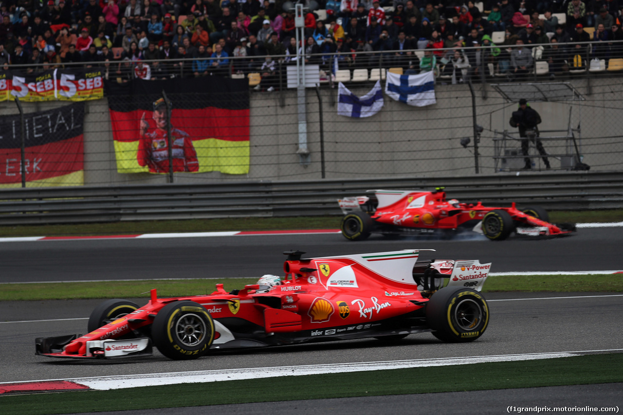 GP CINA, 09.04.2017 - Gara, Sebastian Vettel (GER) Ferrari SF70H e Kimi Raikkonen (FIN) Ferrari SF70H