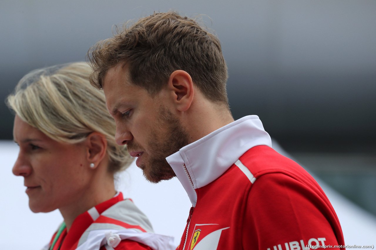GP CINA, 06.04.2017 - Britta Roeske (AUT) Ferrari Press Officer. e Sebastian Vettel (GER) Ferrari SF70H