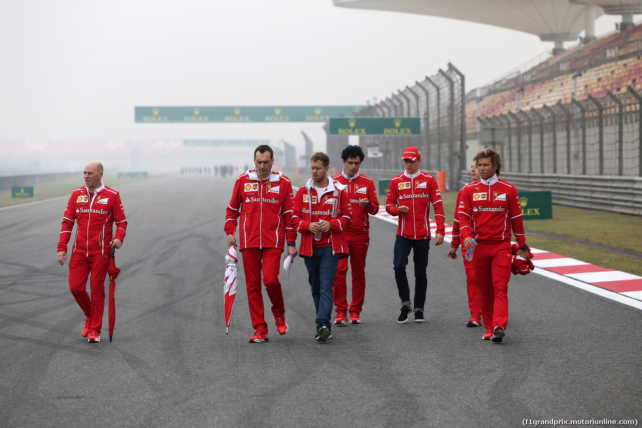 GP CINA, 06.04.2017 - (L-R) Jock Clear (GBR) Ferrari Engineering Director, Riccardo Adami (ITA) Ferrari Gara Engineer e Sebastian Vettel (GER) Ferrari SF70H with Charles Leclerc (MON) Test Driver, Ferrari