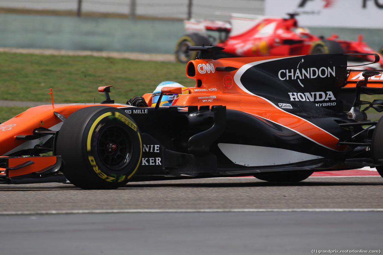 GP CINA, 07.04.2017 - Prove Libere 3, Fernando Alonso (ESP) McLaren MCL32 e Sebastian Vettel (GER) Ferrari SF70H