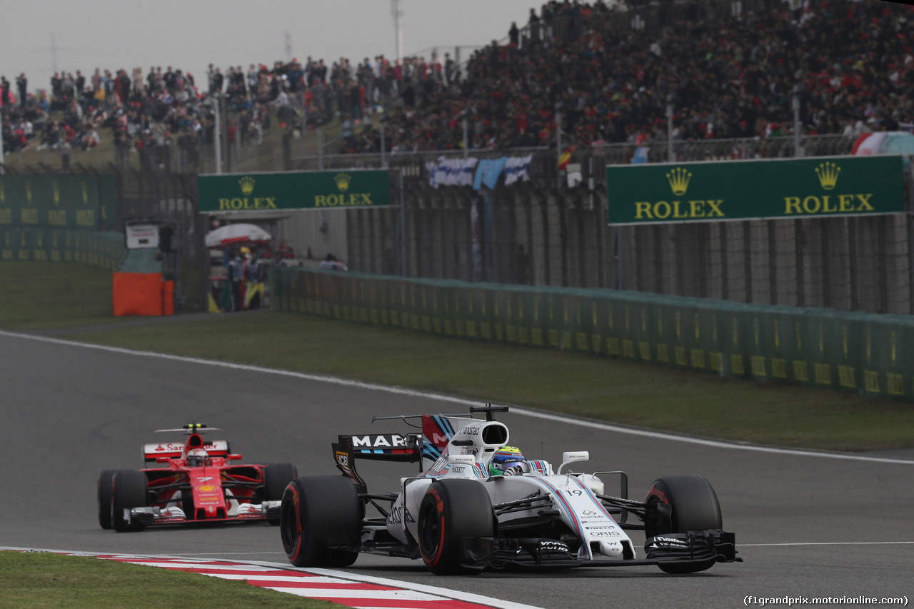 GP CINA, 08.04.2017 - Qualifiche, Kimi Raikkonen (FIN) Ferrari SF70H e Felipe Massa (BRA) Williams FW40