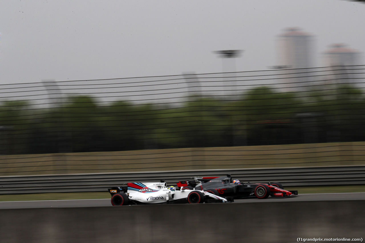 GP CINA, 08.04.2017 - Qualifiche, Felipe Massa (BRA) Williams FW40 e Romain Grosjean (FRA) Haas F1 Team VF-17