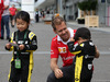 GP GIAPPONE, 05.10.2017- Sebastian Vettel (GER) Ferrari SF70H with young fans