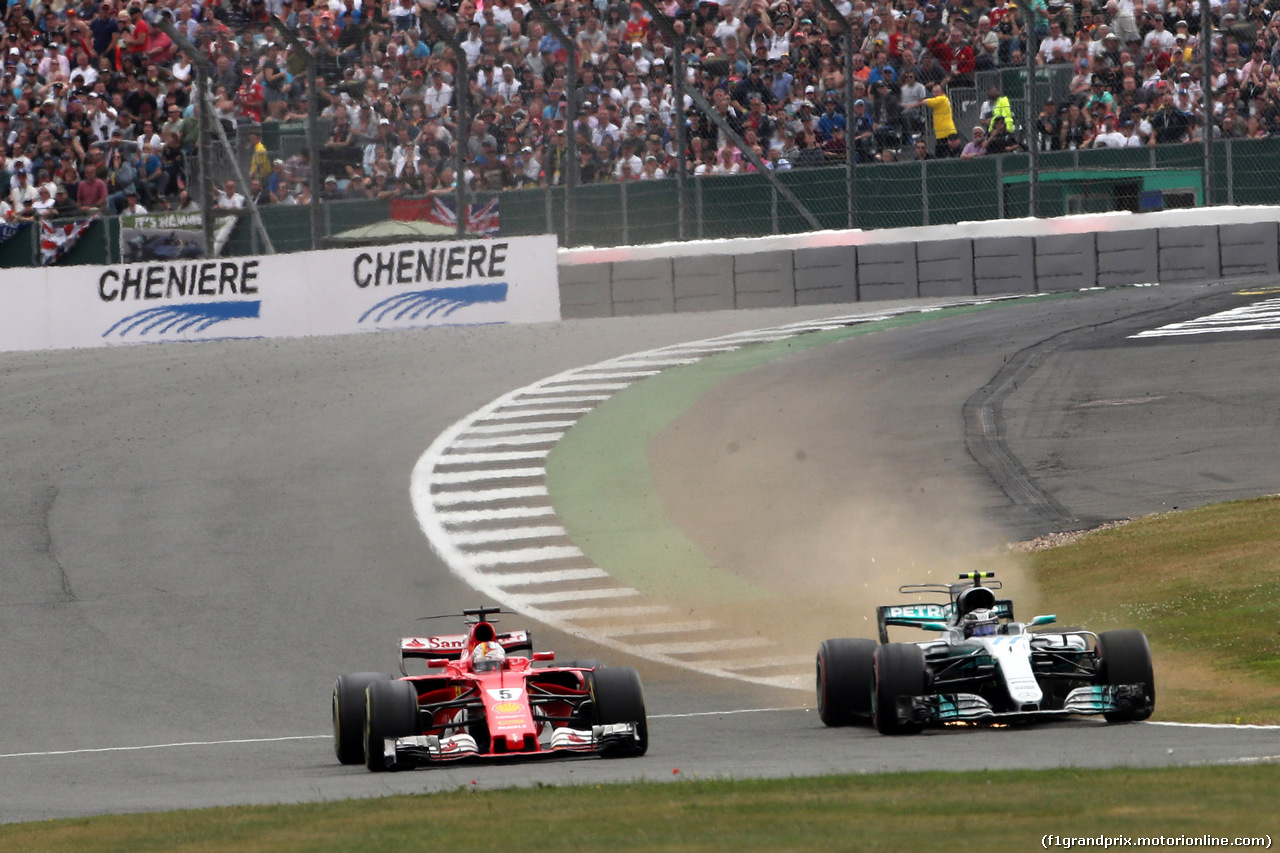 GP GRAN BRETAGNA, 16.07.2017 - Gara, Sebastian Vettel (GER) Ferrari SF70H e Valtteri Bottas (FIN) Mercedes AMG F1 W08