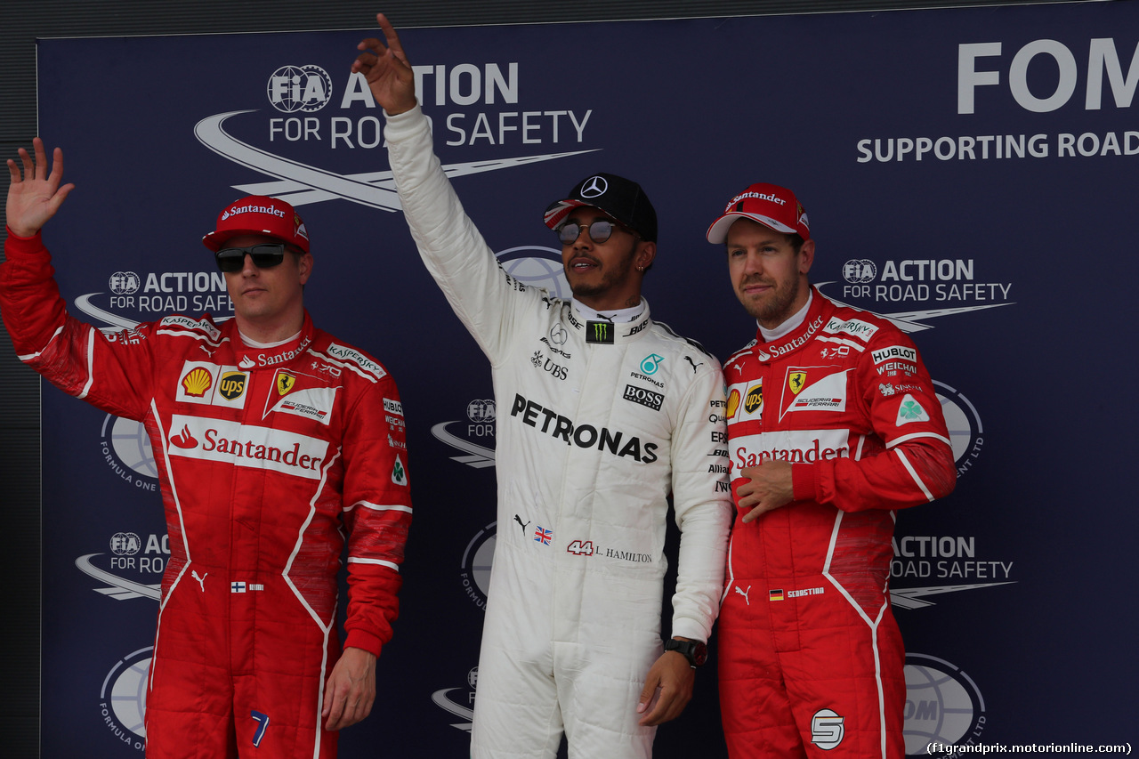 GP GRAN BRETAGNA, 15.07.2017 - Qualifiche, 2nd place Kimi Raikkonen (FIN) Ferrari SF70H, Lewis Hamilton (GBR) Mercedes AMG F1 W08 pole position e 3rd place Sebastian Vettel (GER) Ferrari SF70H