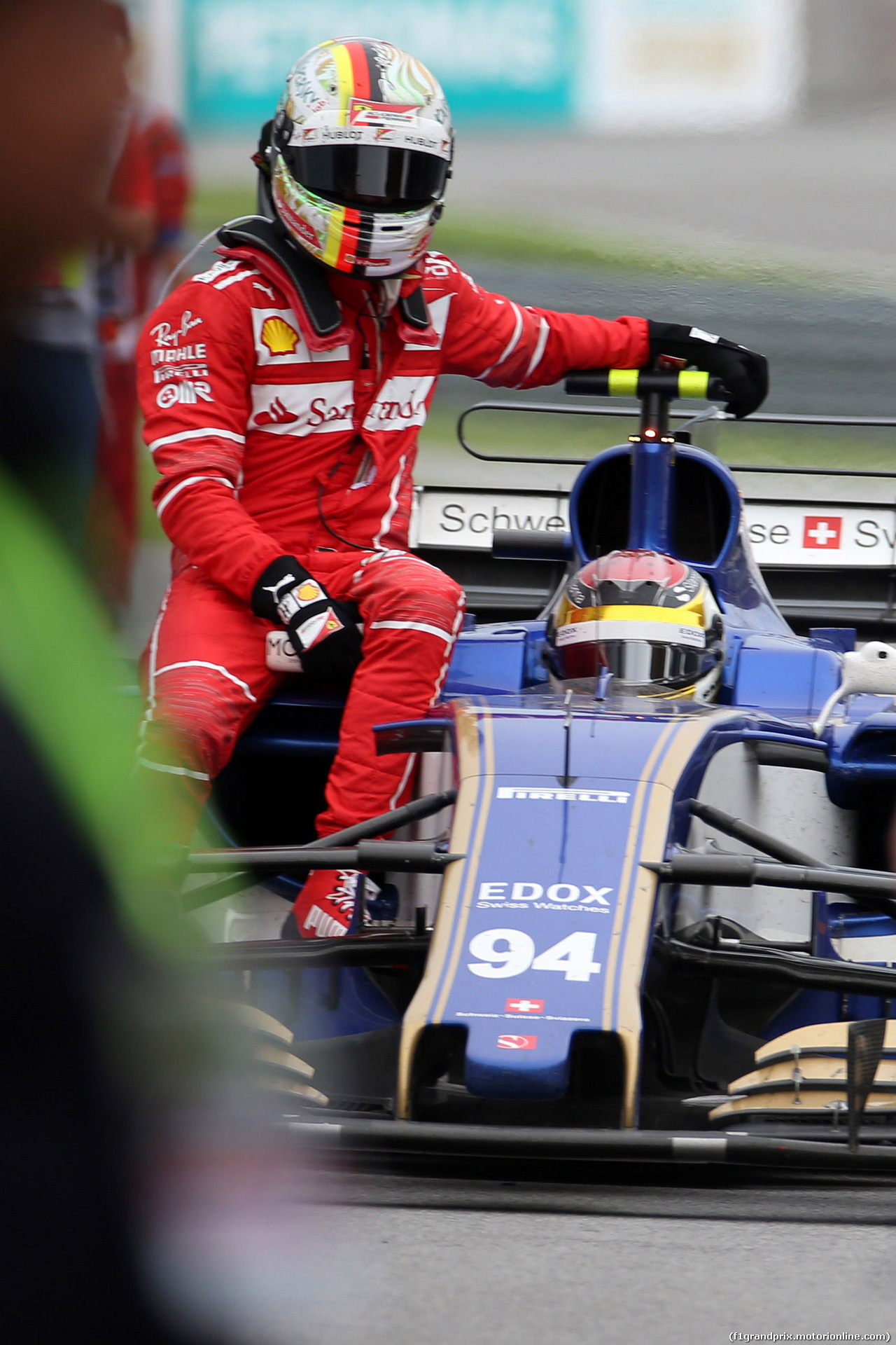GP MALESIA, 01.10.2017 - Gara, Sebastian Vettel (GER) Ferrari SF70H gets a lift to the parc fermé.