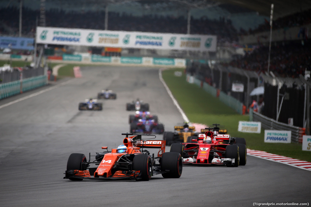 GP MALESIA, 01.10.2017 - Gara, Fernando Alonso (ESP) McLaren MCL32 e Sebastian Vettel (GER) Ferrari SF70H