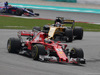 MALAYSIA GP, 01.10.2017 – Rennen, Sebastian Vettel (GER) Ferrari SF70H und Nico Hülkenberg (GER) Renault Sport F1 Team RS17