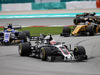 GP MALESIA, 01.10.2017 - Gara, Kevin Magnussen (DEN) Haas F1 Team VF-17 davanti a Pascal Wehrlein (GER) Sauber C36