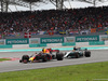 GP MALESIA, 01.10.2017 - Gara, Max Verstappen (NED) Red Bull Racing RB13 overtakes Lewis Hamilton (GBR) Mercedes AMG F1 W08
