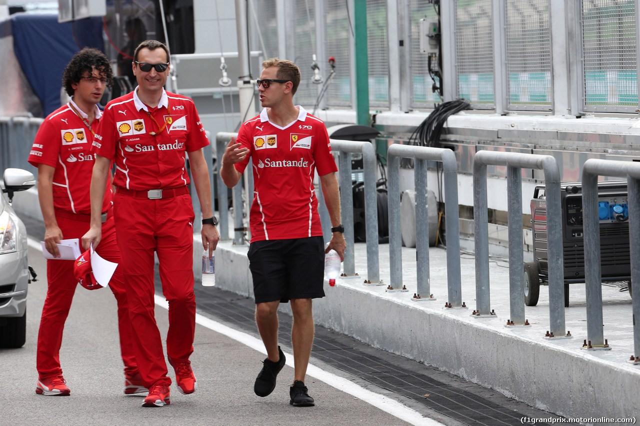 GP MALESIA, 28.09.2017 - Riccardo Adami (ITA) Ferrari Gara Engineer e Sebastian Vettel (GER) Ferrari SF70H