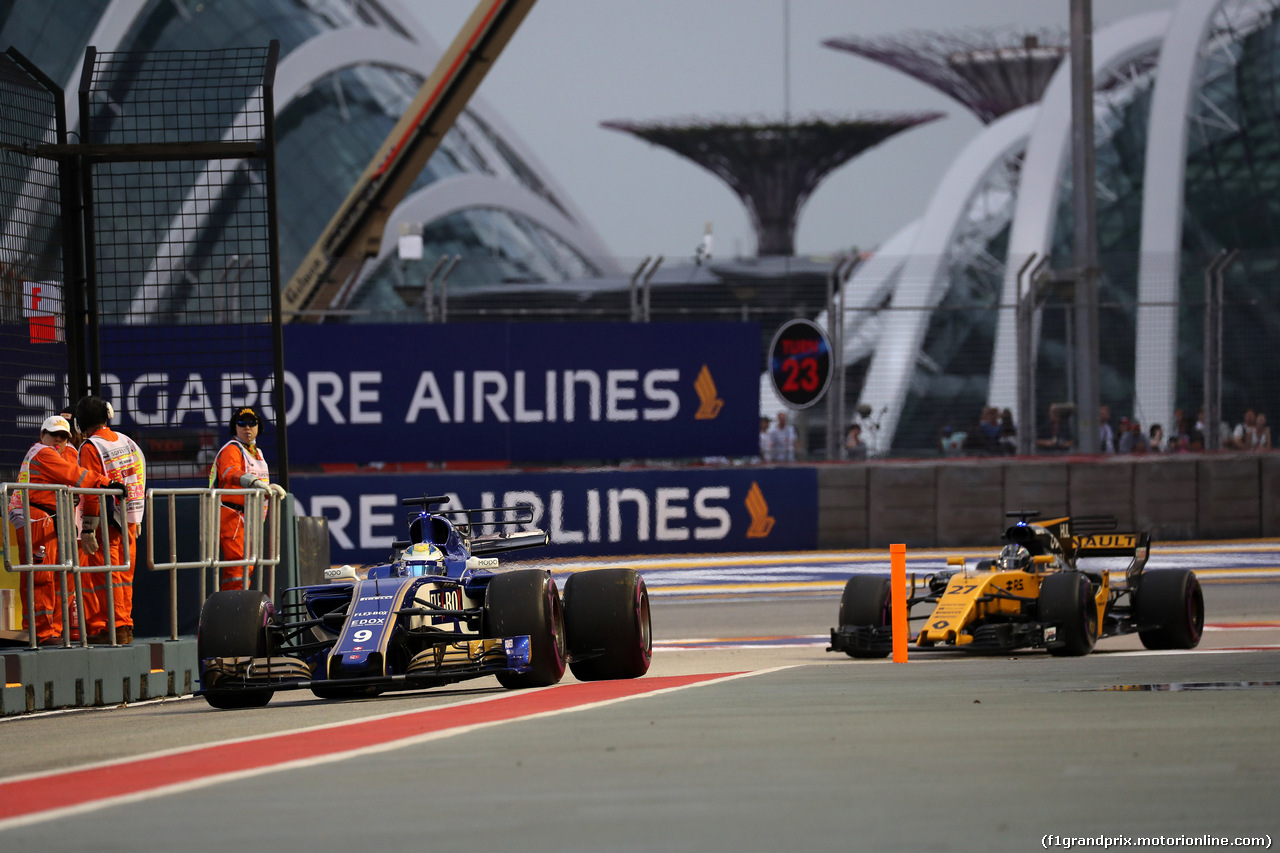GP SINGAPORE, 16.09.2017 - Prove Libere 3, Marcus Ericsson (SUE) Sauber C36 e Nico Hulkenberg (GER) Renault Sport F1 Team RS17