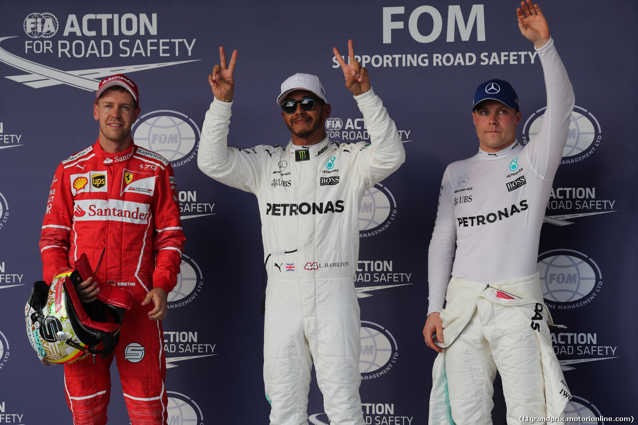 GP STATI UNITI, 21.10.2017 - Qualifiche, 2nd place Sebastian Vettel (GER) Ferrari SF70H, Lewis Hamilton (GBR) Mercedes AMG F1 W08 pole position e 3rd place Valtteri Bottas (FIN) Mercedes AMG F1 W08