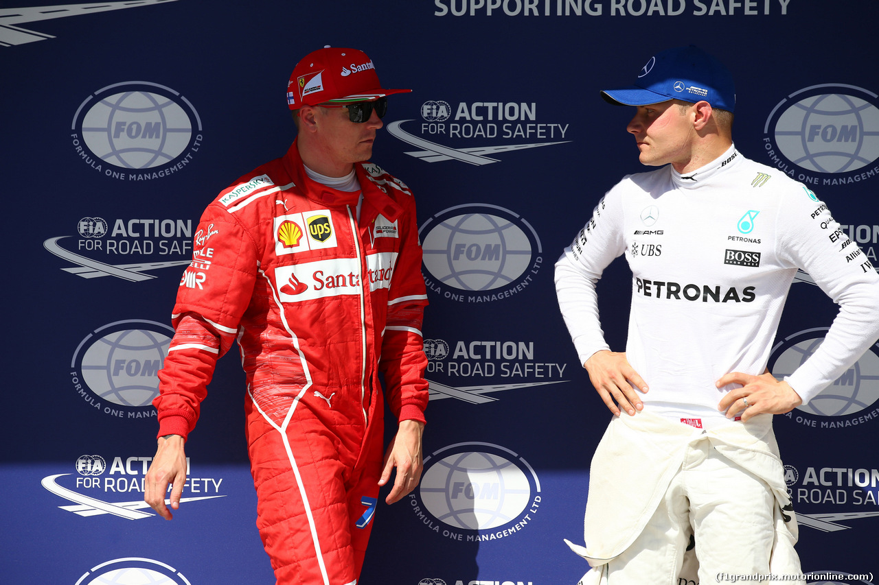 GP UNGHERIA, 29.07.2017 - Qualifiche, Kimi Raikkonen (FIN) Ferrari SF70H e Valtteri Bottas (FIN) Mercedes AMG F1 W08