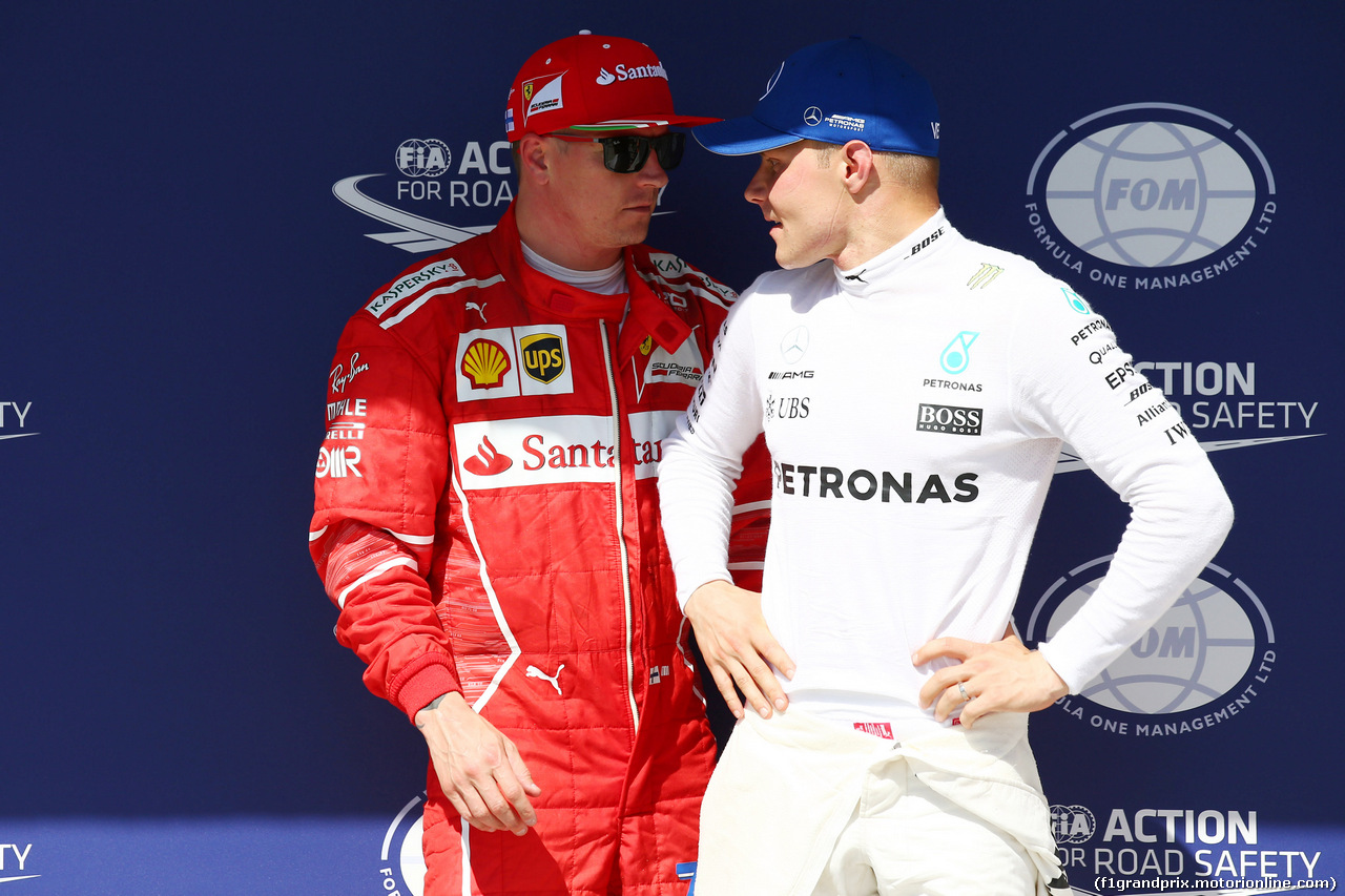 GP UNGHERIA, 29.07.2017 - Qualifiche, Kimi Raikkonen (FIN) Ferrari SF70H e Valtteri Bottas (FIN) Mercedes AMG F1 W08