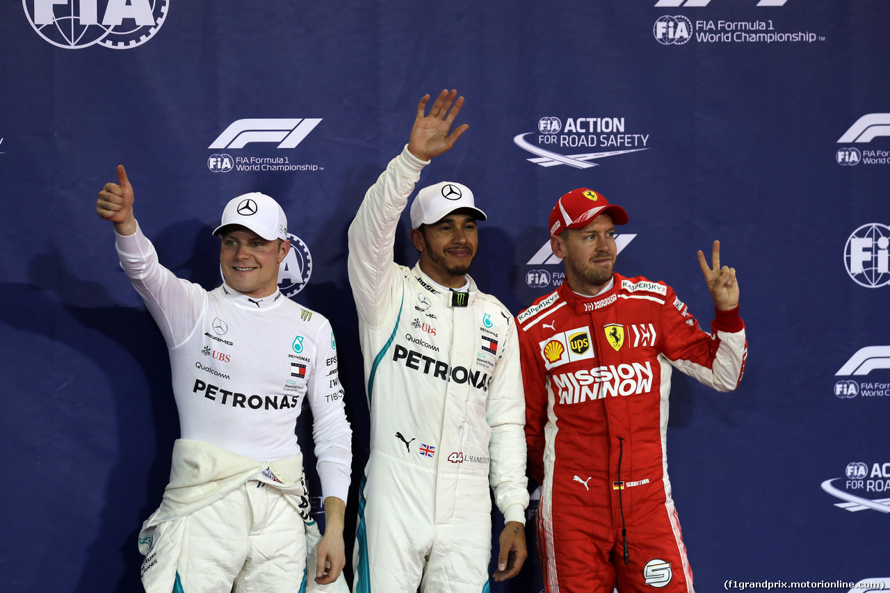 GP ABU DHABI, 24.11.2018 - Qualifiche, 2nd place Valtteri Bottas (FIN) Mercedes AMG F1 W09, Lewis Hamilton (GBR) Mercedes AMG F1 W09 pole position e 3rd place Sebastian Vettel (GER) Ferrari SF71H
