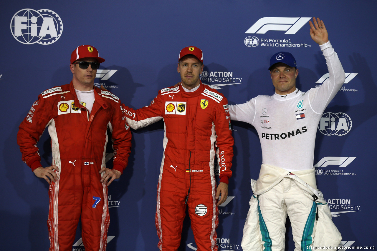 GP BAHRAIN, 07.04.2018 -  Qualifiche, 2nd place Kimi Raikkonen (FIN) Ferrari SF71H, Sebastian Vettel (GER) Ferrari SF71H pole position e 3rd place Valtteri Bottas (FIN) Mercedes AMG F1 W09