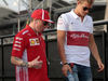 GP BAHRAIN, 08.04.2018 - Kimi Raikkonen (FIN) Ferrari SF71H e Marcus Ericsson (SUE) Sauber C37