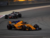 GP BAHRAIN, 08.04.2018 - Gara, Stoffel Vandoorne (BEL) McLaren MCL33 davanti a Romain Grosjean (FRA) Haas F1 Team VF-18