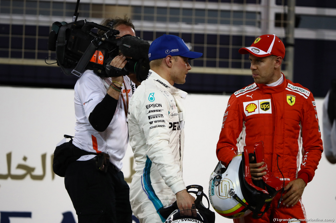 GP BAHRAIN, 07.04.2018 -  Qualifiche, Valtteri Bottas (FIN) Mercedes AMG F1 W09 e Sebastian Vettel (GER) Ferrari SF71H