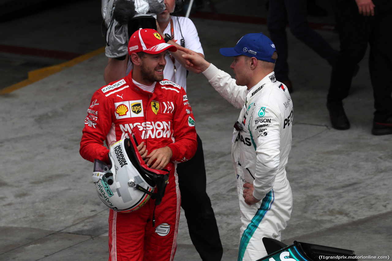 GP BRASILE, 10.11.2018 - Qualifiche, 2nd place Sebastian Vettel (GER) Ferrari SF71H e 3rd place Valtteri Bottas (FIN) Mercedes AMG F1 W09