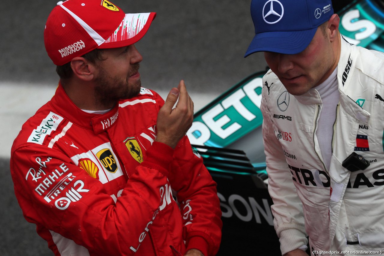 GP BRASILE, 10.11.2018 - Qualifiche, 2nd place Sebastian Vettel (GER) Ferrari SF71H e 3rd place Valtteri Bottas (FIN) Mercedes AMG F1 W09