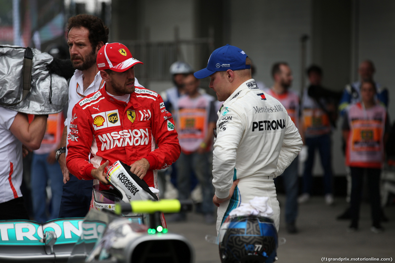 GP BRASILE, 10.11.2018 - Qualifiche, 2nd place Sebastian Vettel (GER) Ferrari SF71H e 3rd place Valtteri Bottas (FIN) Mercedes AMG F1 W09
