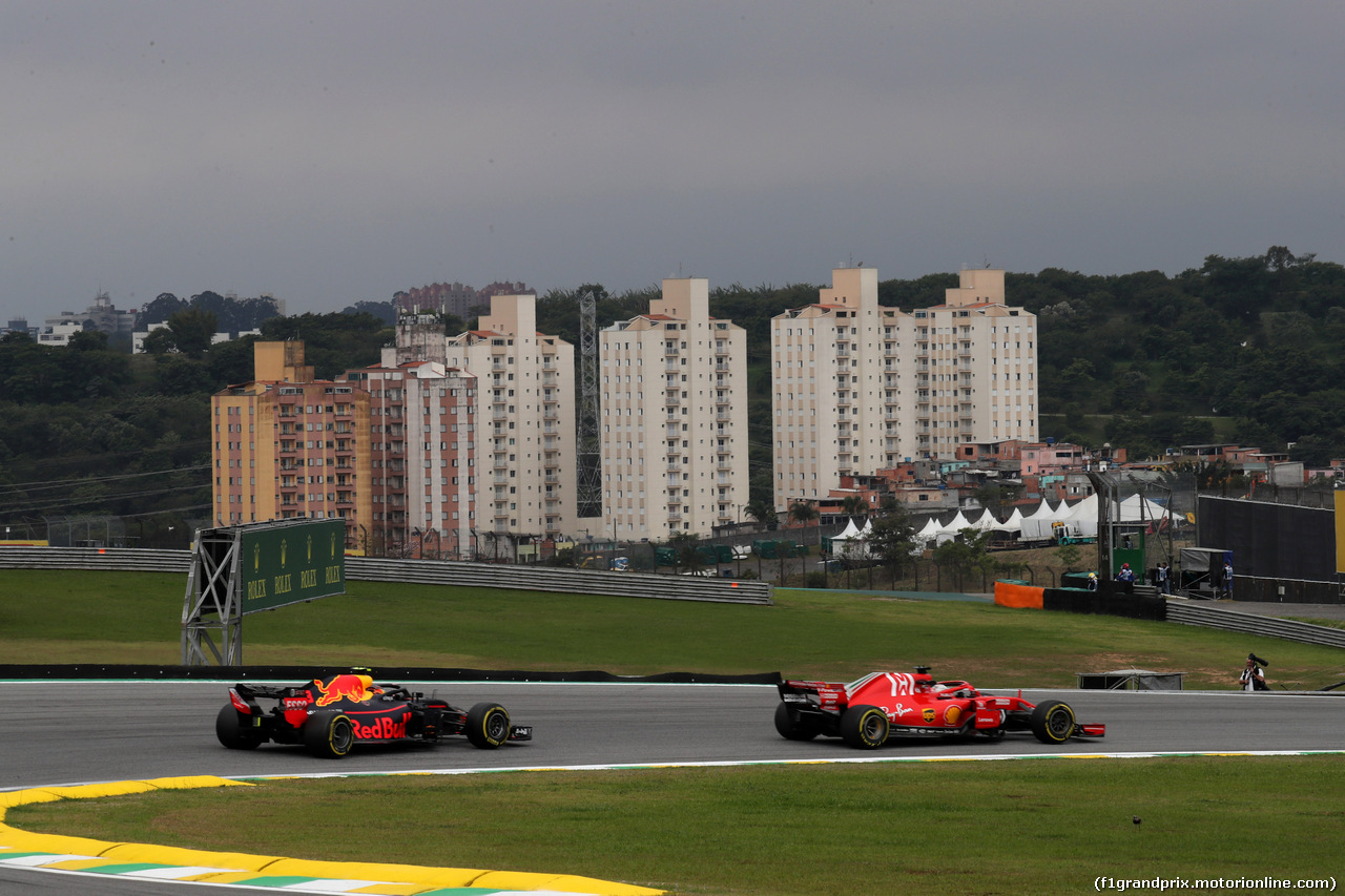 GP BRASILE, 09.11.2018 - Prove Libere 2, Max Verstappen (NED) Red Bull Racing RB14 e Sebastian Vettel (GER) Ferrari SF71H