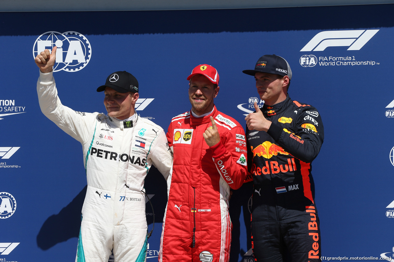 GP CANADA, 09.06.2018- Pole Position celebration: pole Sebastian Vettel (GER) Ferrari SF71H, 2nd Valtteri Bottas (FIN) Mercedes AMG F1 W09, 3rd Max Verstappen (NED) Red Bull Racing RB14