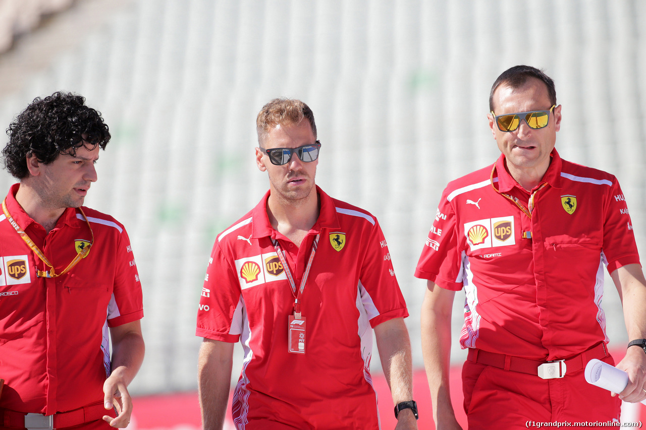 GP GERMANIA, 19.07.2018 - Edoardo Brosco (ITA) Ferrari F1 – Track Engineer, Sebastian Vettel (GER) Ferrari SF71H e Riccardo Adami (ITA) Ferrari Gara Engineer