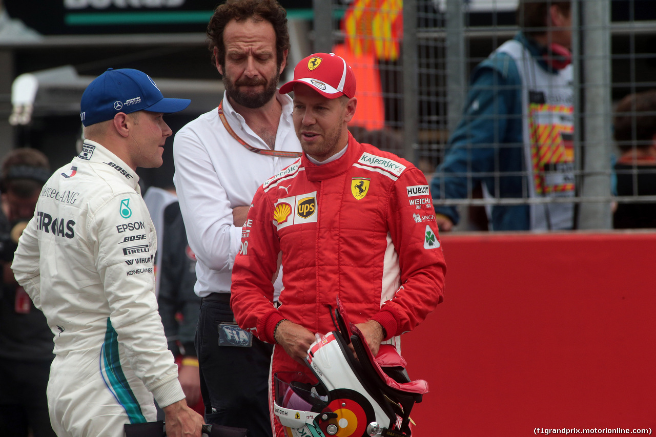 GP GERMANIA, 21.07.2018 - Qualifiche, 2nd place Valtteri Bottas (FIN) Mercedes AMG F1 W09 e Sebastian Vettel (GER) Ferrari SF71H pole position