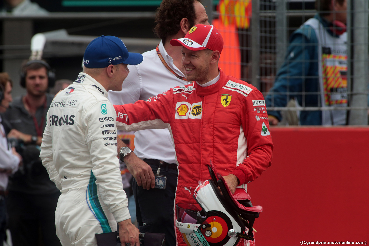 GP GERMANIA, 21.07.2018 - Qualifiche, 2nd place Valtteri Bottas (FIN) Mercedes AMG F1 W09 e Sebastian Vettel (GER) Ferrari SF71H pole position