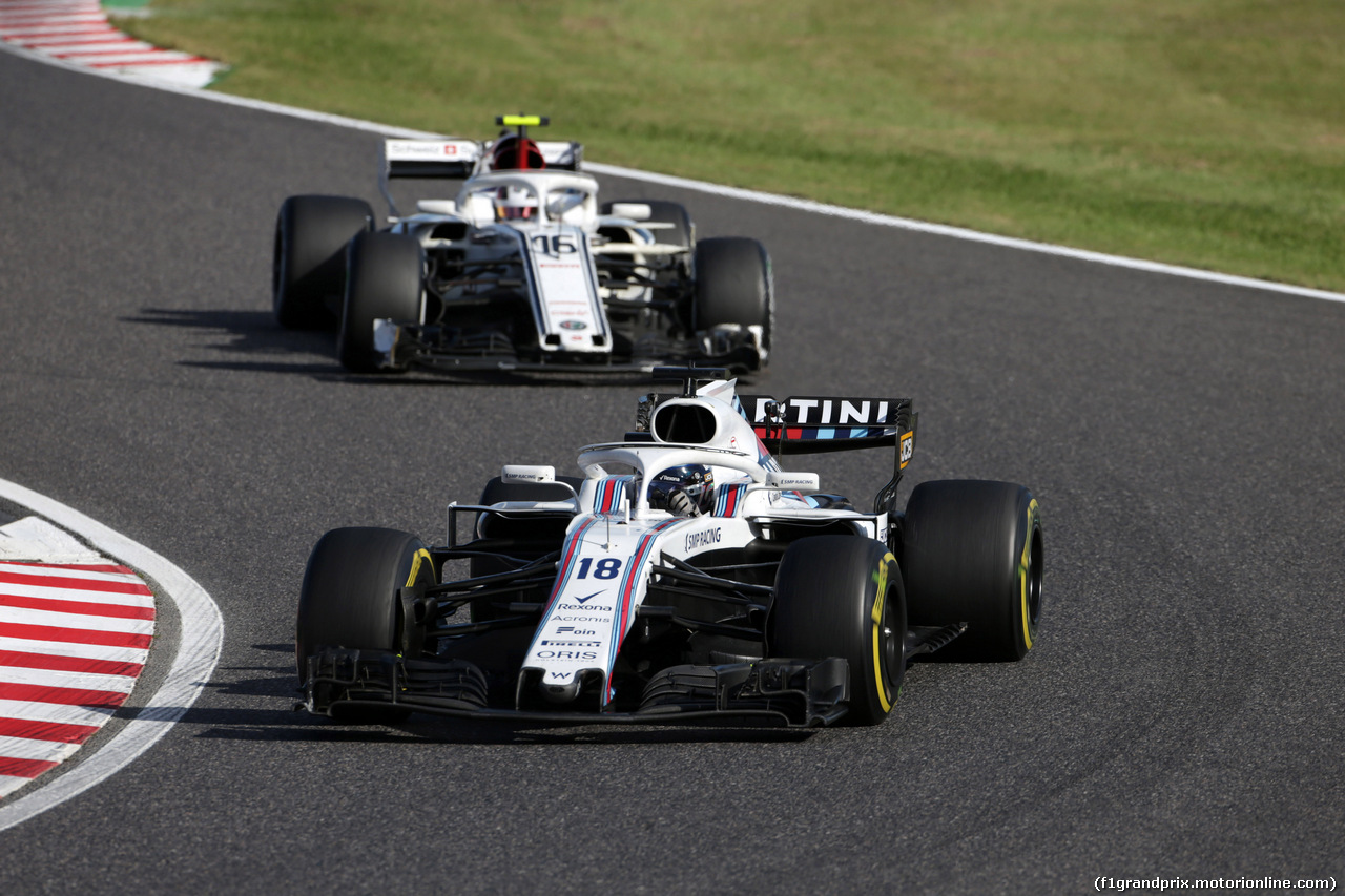 GP GIAPPONE, 07.10.2018 - Gara, Lance Stroll (CDN) Williams FW41 davanti a Charles Leclerc (MON) Sauber C37