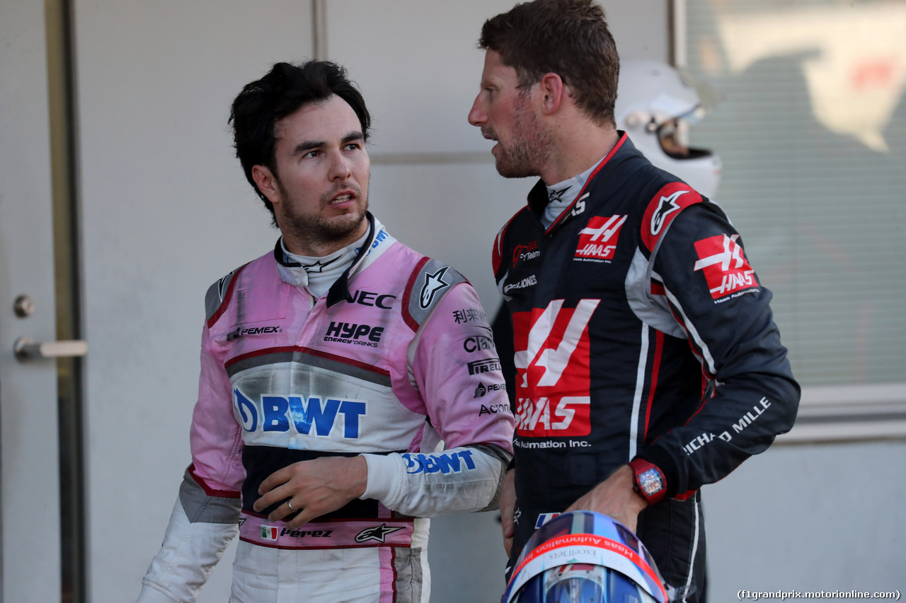 GP GIAPPONE, 07.10.2018 - Gara, Sergio Perez (MEX) Racing Point Force India F1 VJM11 e Romain Grosjean (FRA) Haas F1 Team VF-18