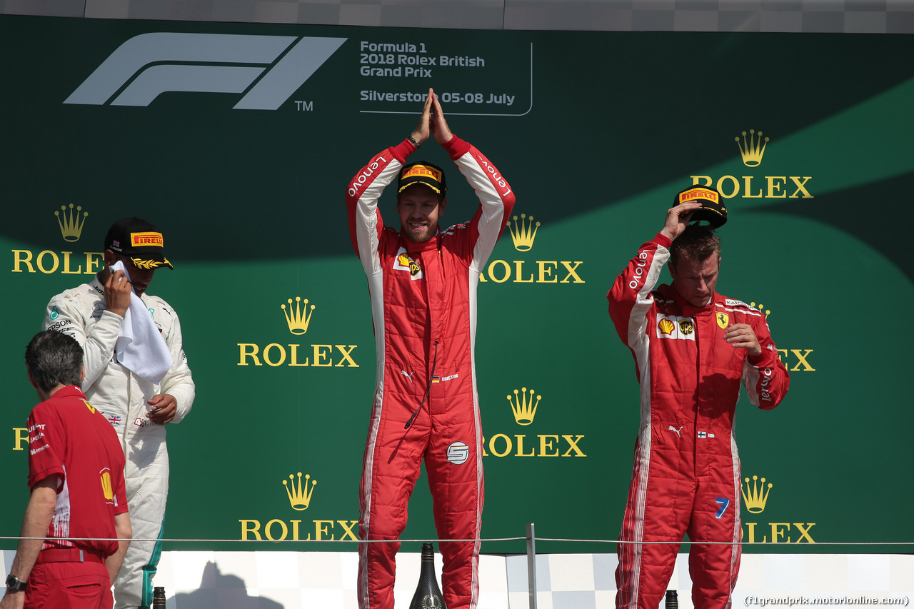 GP GRAN BRETAGNA, 08.07.2018- Podium, winner Sebastian Vettel (GER) Ferrari SF71H, 2nd place Lewis Hamilton (GBR) Mercedes AMG F1 W09, 3rd Kimi Raikkonen (FIN) Ferrari SF71H
