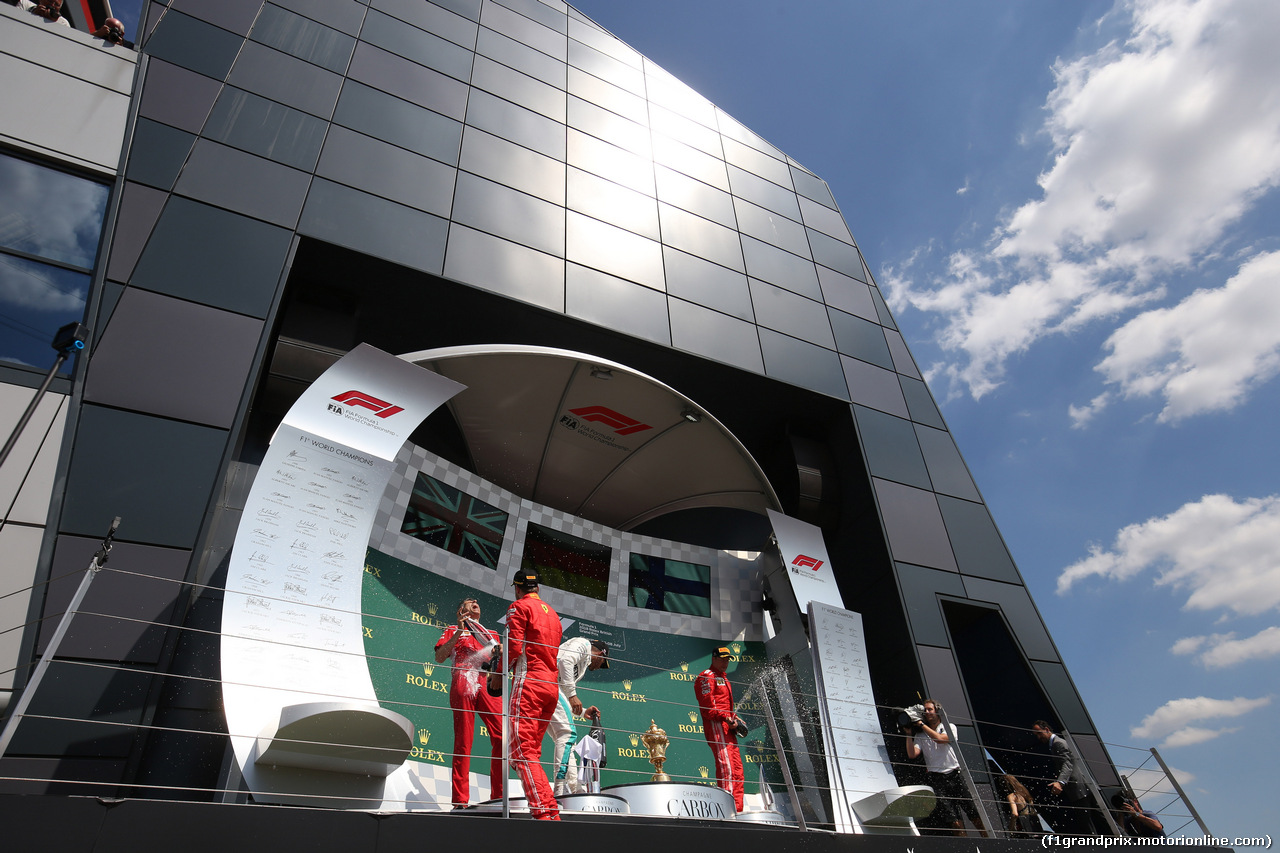 GP GRAN BRETAGNA, 08.07.2018- Podium, winner Sebastian Vettel (GER) Ferrari SF71H, 2nd place Lewis Hamilton (GBR) Mercedes AMG F1 W09, 3rd Kimi Raikkonen (FIN) Ferrari SF71H