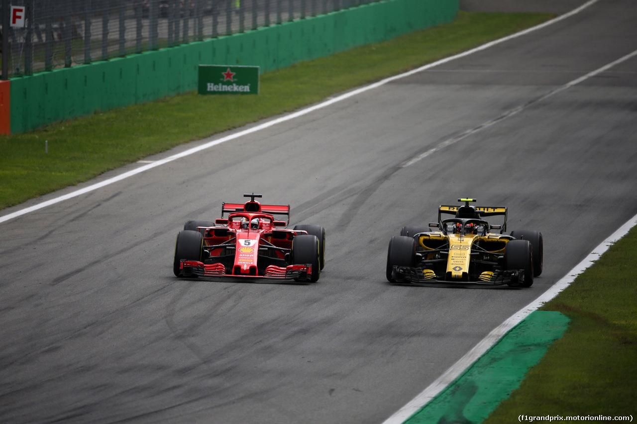 GP ITALIA, 02.09.2018 - Gara, Sebastian Vettel (GER) Ferrari SF71H e Carlos Sainz Jr (ESP) Renault Sport F1 Team RS18