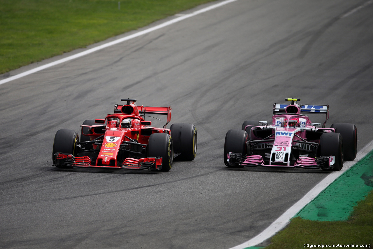 GP ITALIA, 02.09.2018 - Gara, Sebastian Vettel (GER) Ferrari SF71H e Esteban Ocon (FRA) Racing Point Force India F1 VJM11