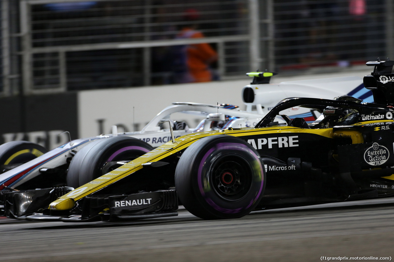 GP SINGAPORE, 16.09.2018 - Gara, Sergey Sirotkin (RUS) Williams FW41 e Nico Hulkenberg (GER) Renault Sport F1 Team RS18