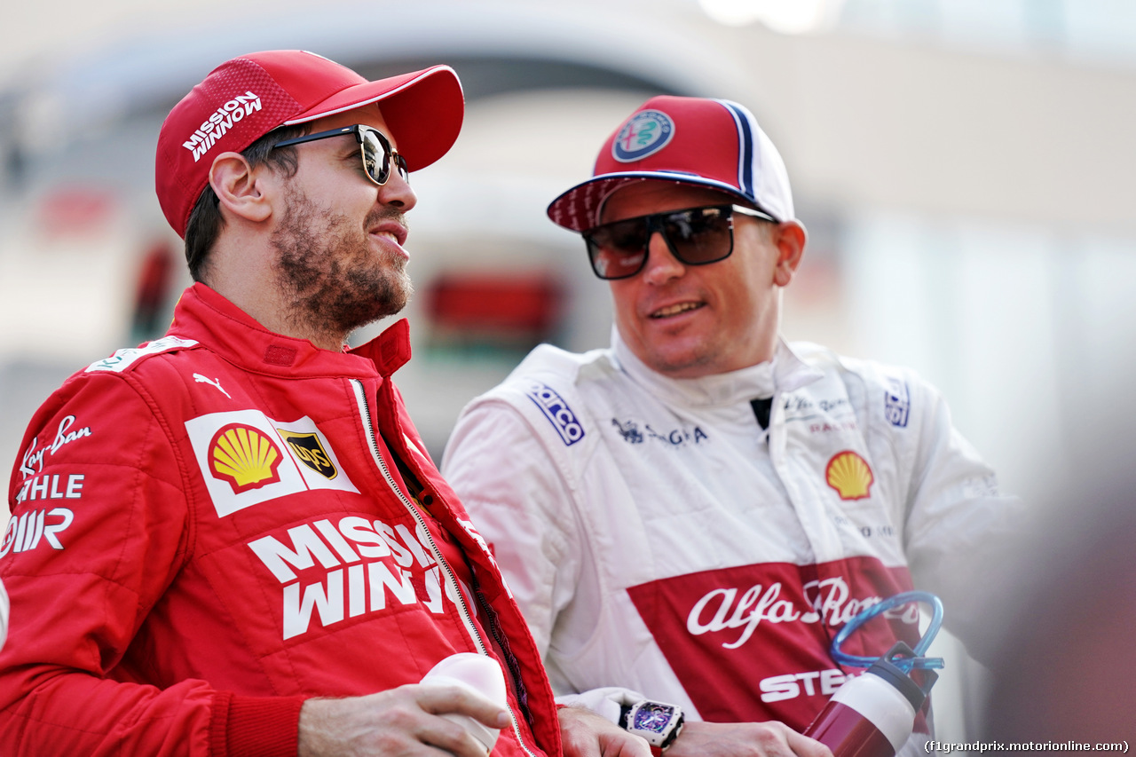 GP ABU DHABI, (L to R): Sebastian Vettel (GER) Ferrari with Kimi Raikkonen (FIN) Alfa Romeo Racing on the drivers parade.
01.12.2019.