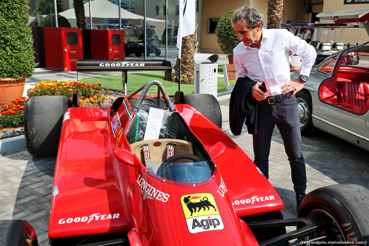 GP ABU DHABI, Alain Prost (FRA) Renault F1 Team Special Advisor with the 1982 Ferrari 126C2 driven by Patrick Tambay on display in the paddock - Sotherby's.
30.11.2019.