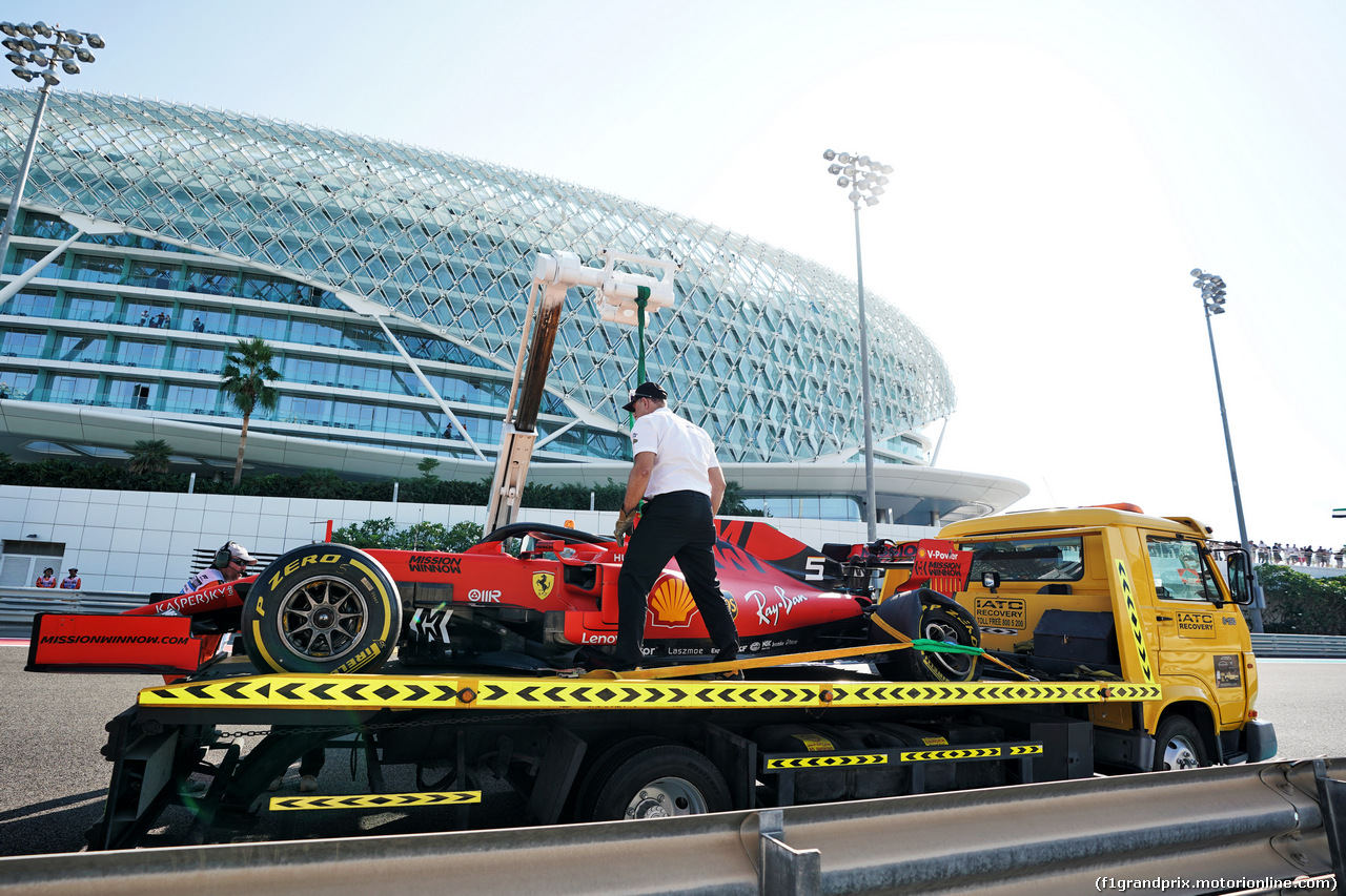 GP ABU DHABI, The Ferrari SF90 of Sebastian Vettel (GER) Ferrari is recovered back to the pits on the back of a truck in the first practice session.                               
29.11.2019.