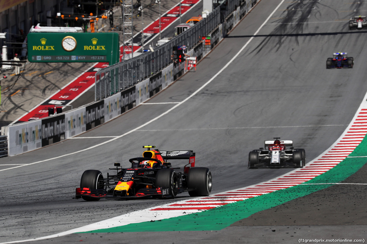 GP AUSTRIA, 30.06.2019 - Gara, Pierre Gasly (FRA) Red Bull Racing RB15 Kimi Raikkonen (FIN) Alfa Romeo Racing C38 and