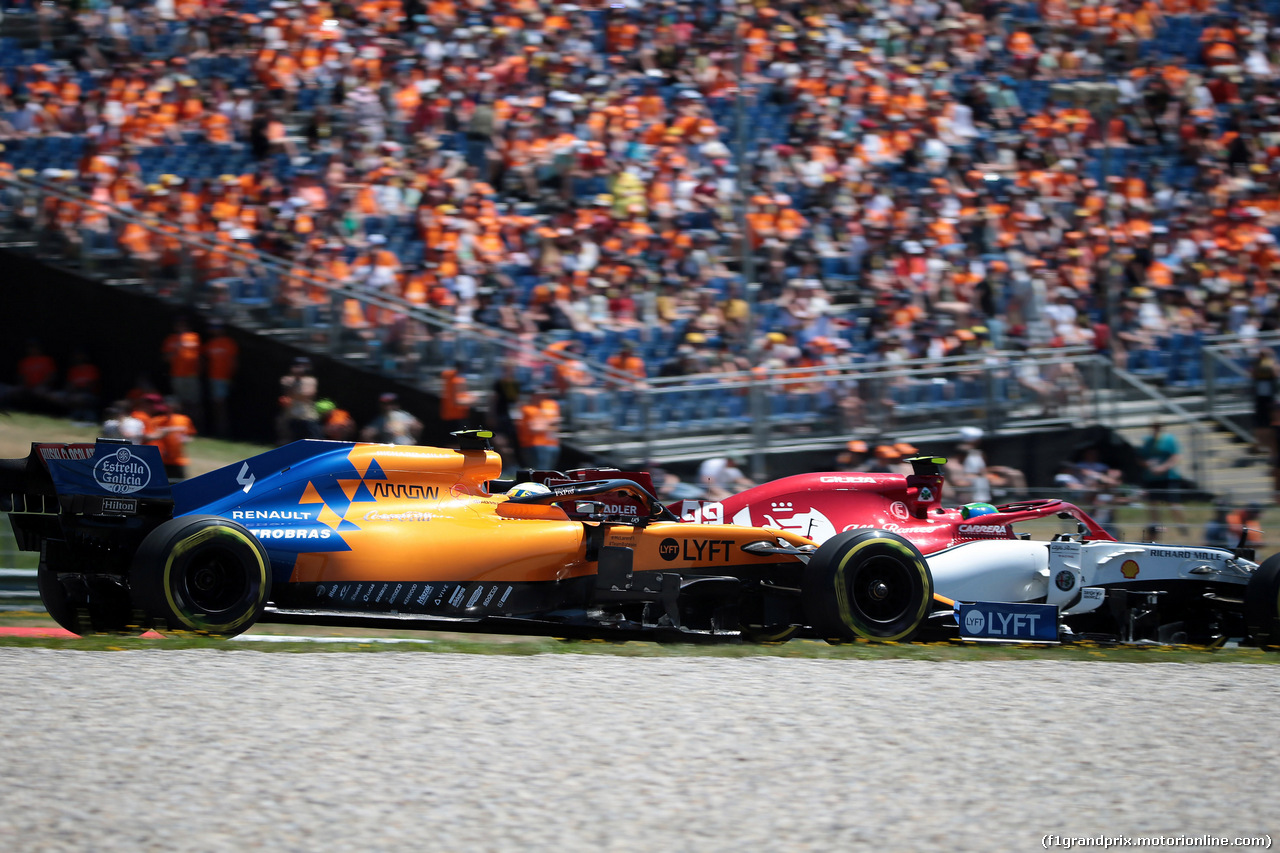 GP AUSTRIA, 29.06.2019 - Prove Libere 3, Lando Norris (GBR) Mclaren F1 Team MCL34 e Antonio Giovinazzi (ITA) Alfa Romeo Racing C38