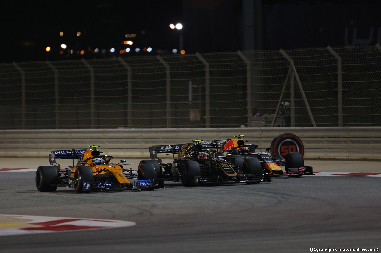 GP BAHRAIN, 31.03.2019- Gara, Kevin Magnussen (DEN) Haas F1 Team VF-19 in fight with Lando Norris (GBR) Mclaren F1 Team MCL34 e Pierre Gasly (FRA) Redbull Racing RB15